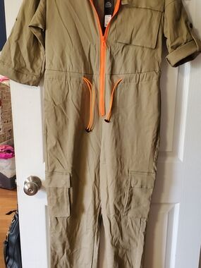 New Fashion Nova cargo jumpsuit in olive green with vibrant orange zipper